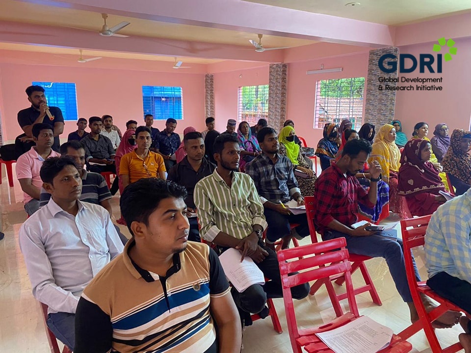 Data collectors attending a training session in a classroom setting