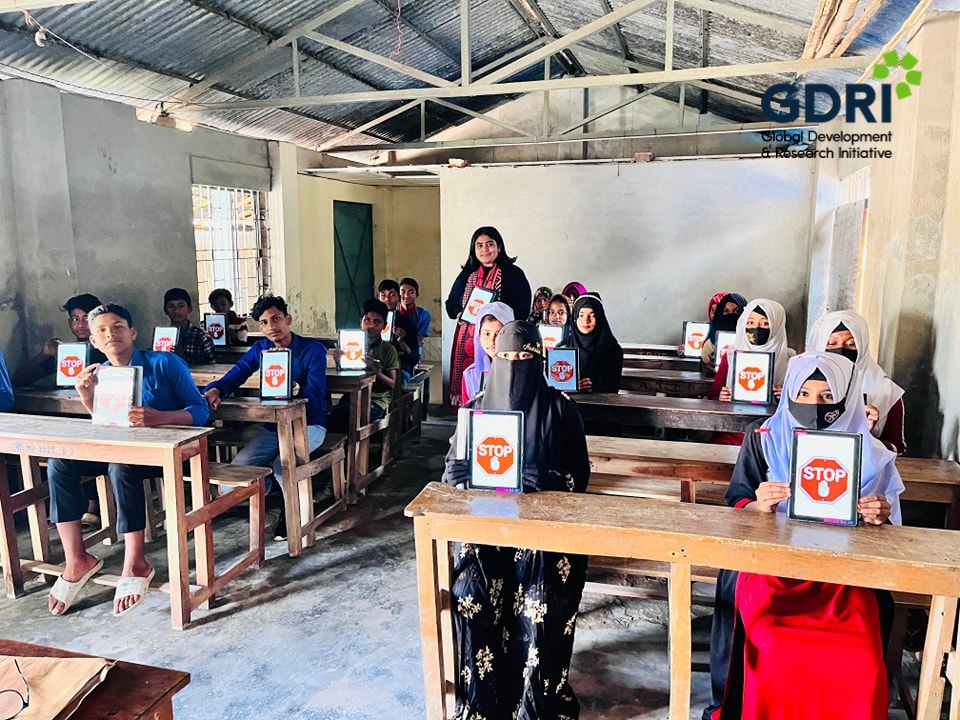 Primary school students taking assessments via iPads under the “Bridging Learning Gaps with Out-of-School Learning Program” project in Bangladesh