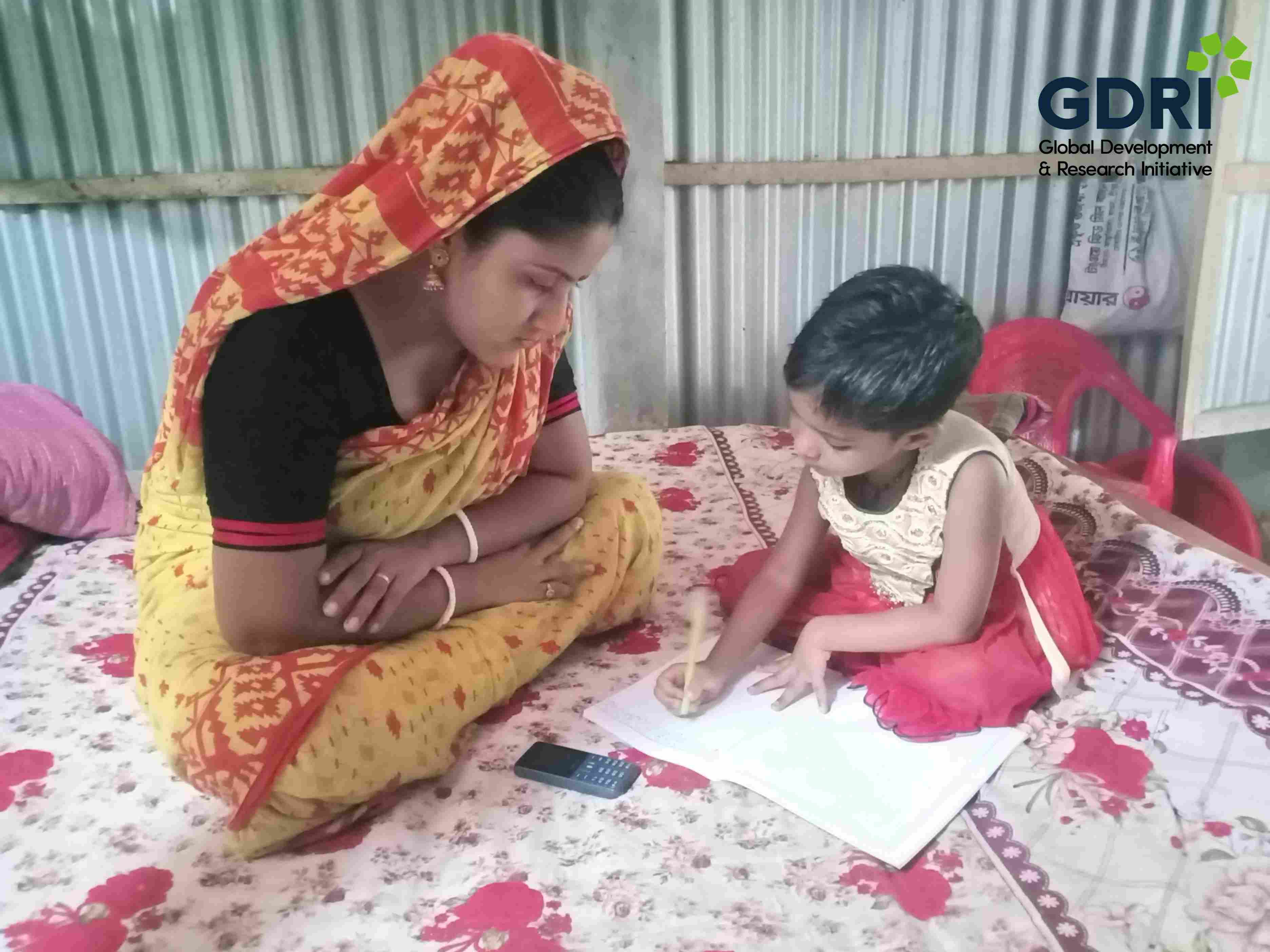 Mothers supporting children’s learning via mobile mentoring under the “Telementoring and Homeschooling during School Closures” project in Bangladesh